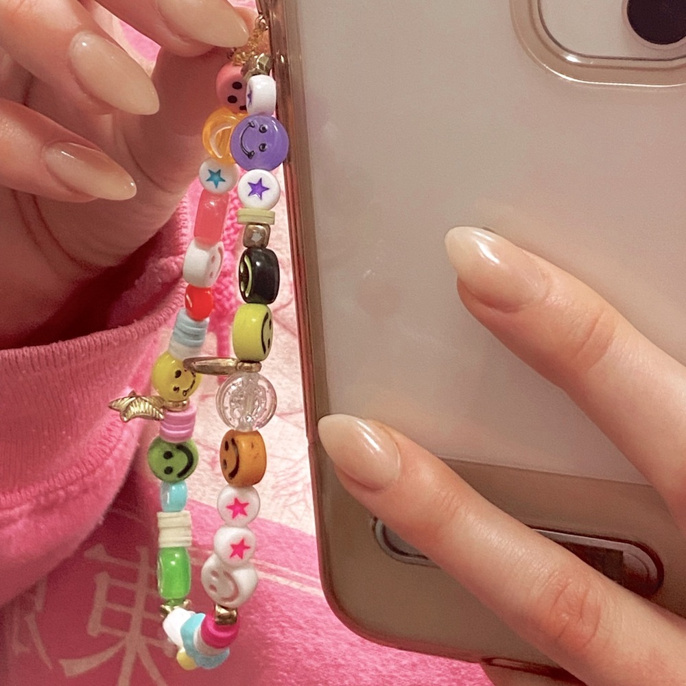 FREE with purchase, receive a customized keychain phone bauble!